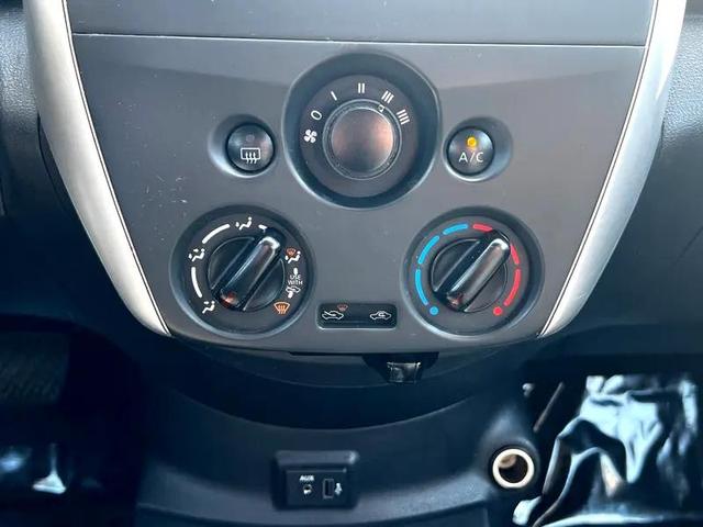 Photo of 2019 Cayenne Red Metallic Nissan Versa
