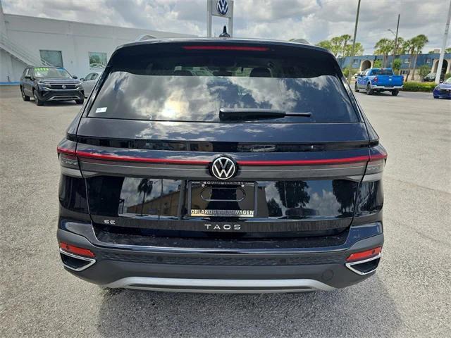 Photo of 2025 Deep Black Pearl Volkswagen Taos