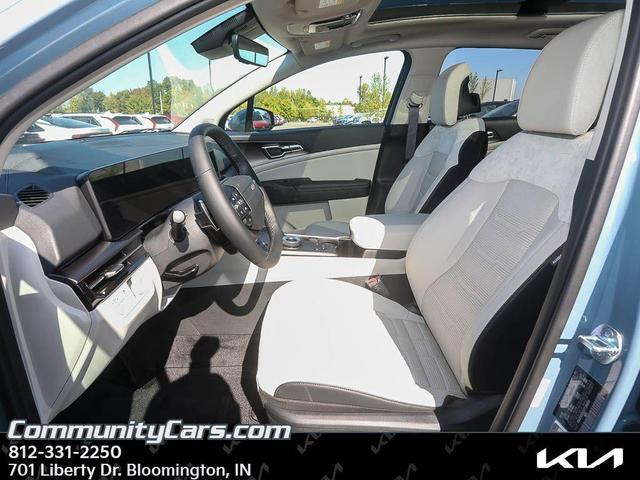 Photo of 2026 Heritage Blue Kia Sportage Hybrid