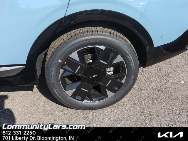 Photo of 2026 Heritage Blue Kia Sportage Hybrid