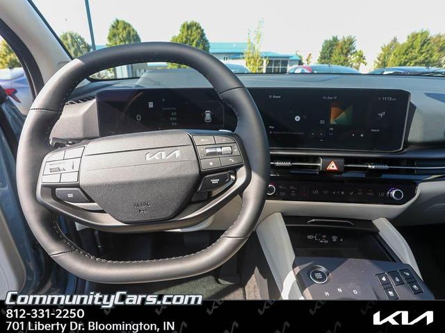 Photo of 2026 Heritage Blue Kia Sportage Hybrid