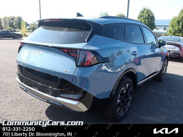 Photo of 2026 Heritage Blue Kia Sportage Hybrid