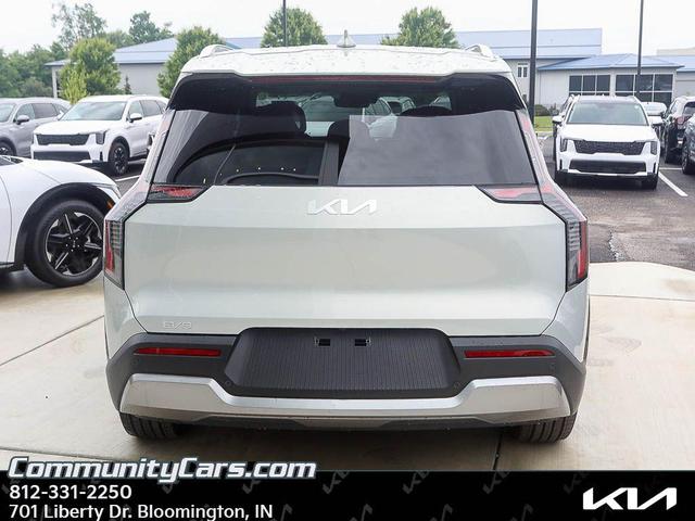 Photo of 2026 Ivory Silver Kia EV9