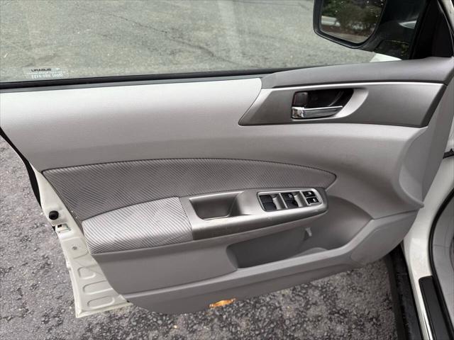 Photo of 2010 Satin White Pearl Subaru Forester