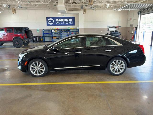 Photo of 2014 Black Raven Cadillac XTS