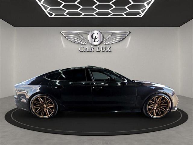 Photo of 2015 Phantom Black Pearl Effect Audi RS 7
