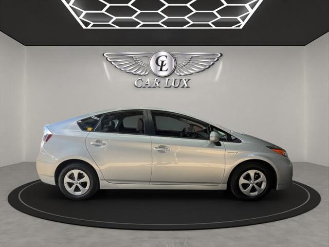 Photo of 2015 Classic Silver Metallic Toyota Prius