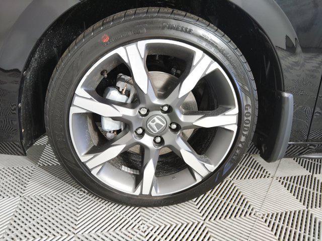Photo of 2025 Crystal Black Pearl Honda Civic Hybrid