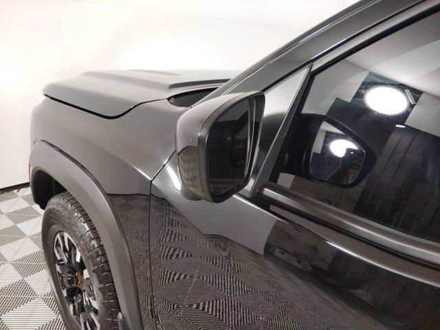 Photo of 2023 Super Black Nissan Frontier