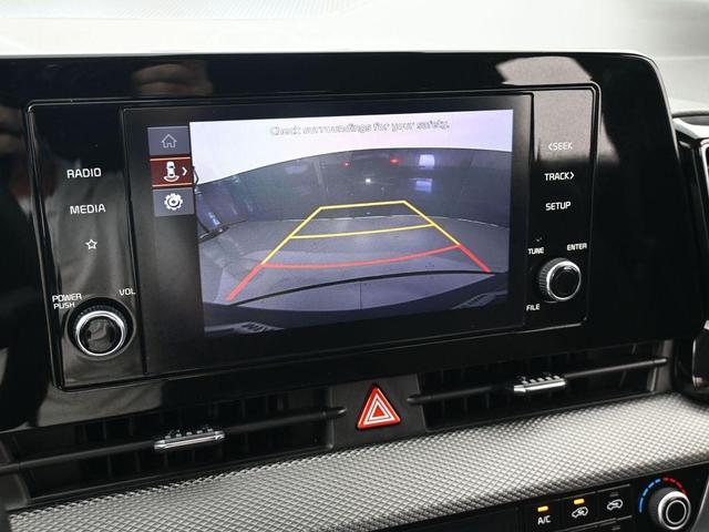 Photo of 2023 Fusion Orange Kia Sportage Hybrid