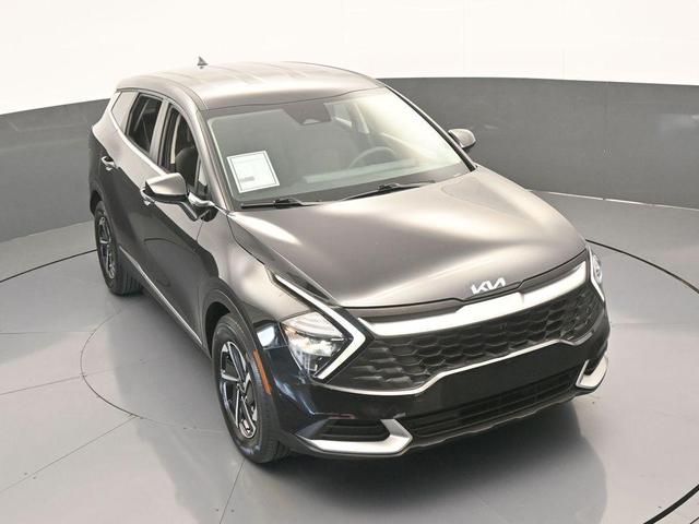 Photo of 2023 Fusion Orange Kia Sportage Hybrid