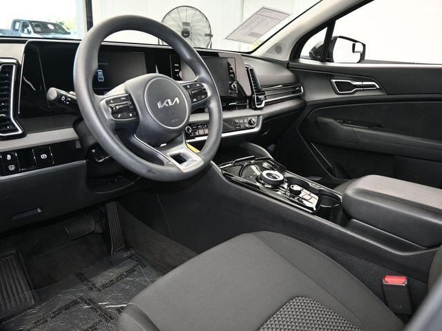 Photo of 2023 Fusion Orange Kia Sportage Hybrid