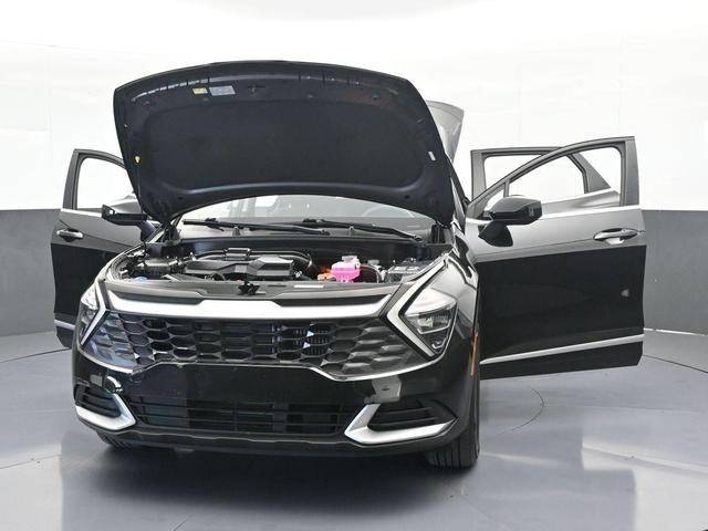 Photo of 2023 Fusion Orange Kia Sportage Hybrid