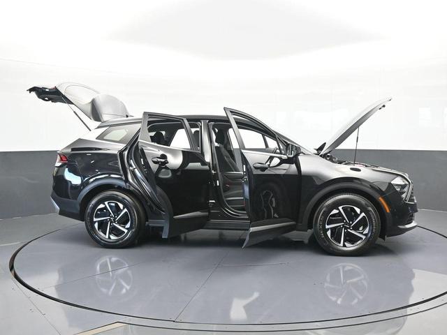 Photo of 2023 Fusion Orange Kia Sportage Hybrid