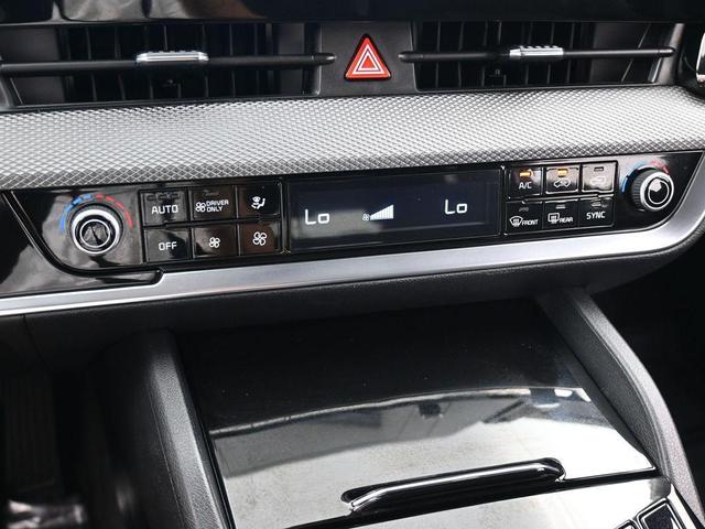 Photo of 2023 Fusion Orange Kia Sportage Hybrid