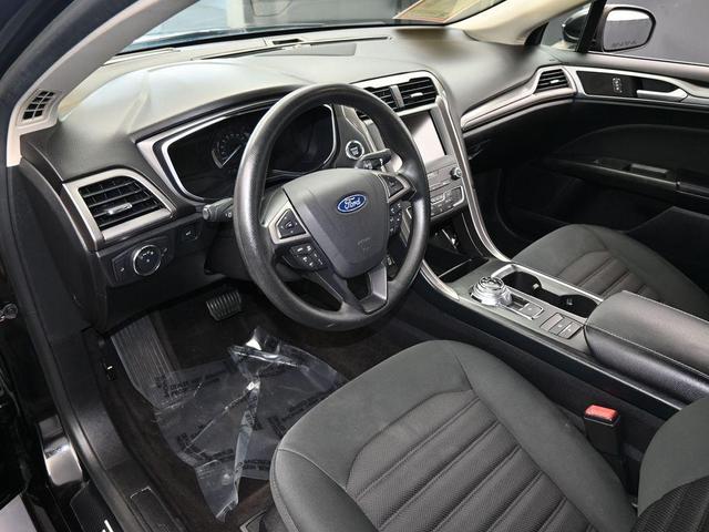 Photo of 2019 Black Ford Fusion Hybrid