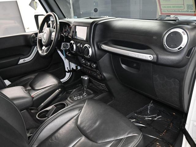 Photo of 2016 Bright White Clearcoat Jeep Wrangler
