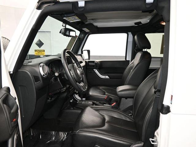 Photo of 2016 Bright White Clearcoat Jeep Wrangler