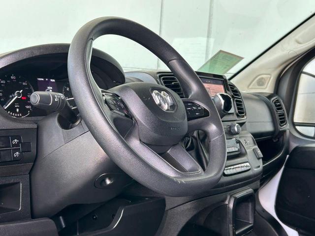 Photo of 2023 Bright White Clearcoat RAM ProMaster 2500