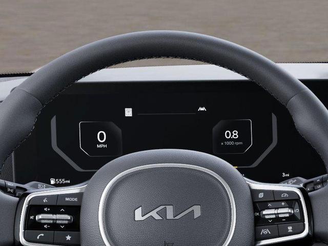 Photo of 2025 Astra Blue Kia Carnival Hybrid