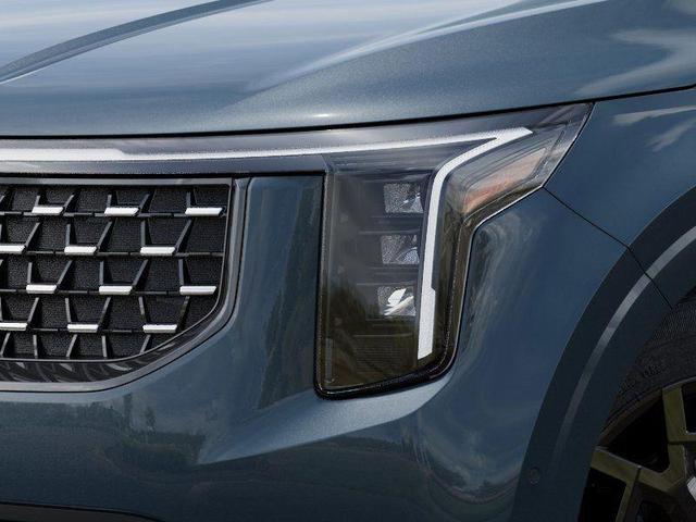 Photo of 2025 Astra Blue Kia Carnival Hybrid