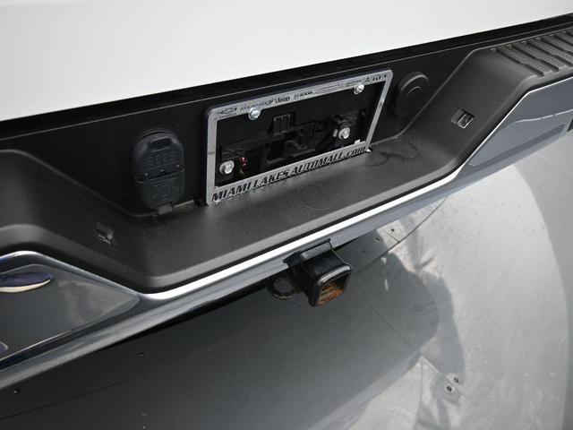 Photo of 2024 Summit White GMC Sierra 1500