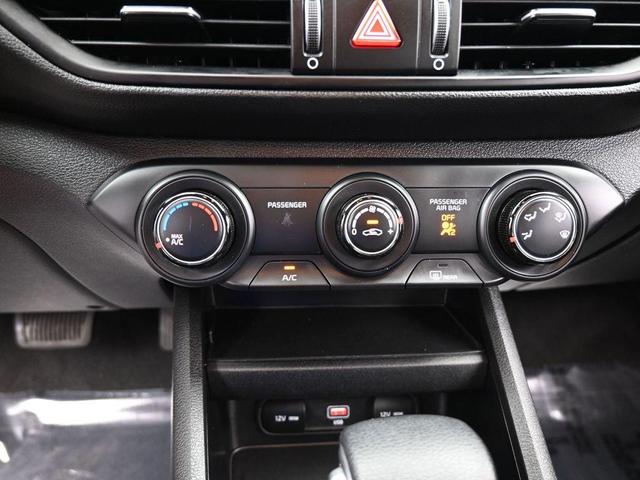 Photo of 2023 Currant Red Kia Forte