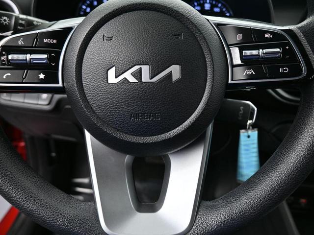 Photo of 2023 Currant Red Kia Forte