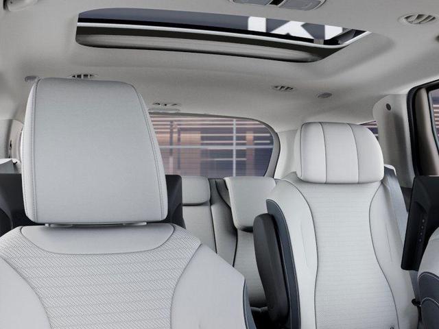 Photo of 2025 Ivory Silver Kia Carnival Hybrid