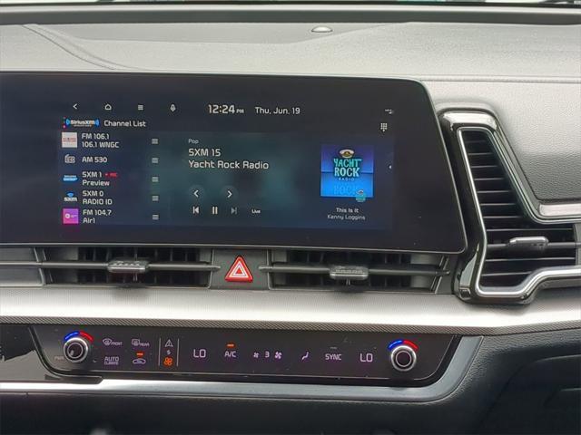 Photo of 2023 Sapphire Blue Kia Sportage
