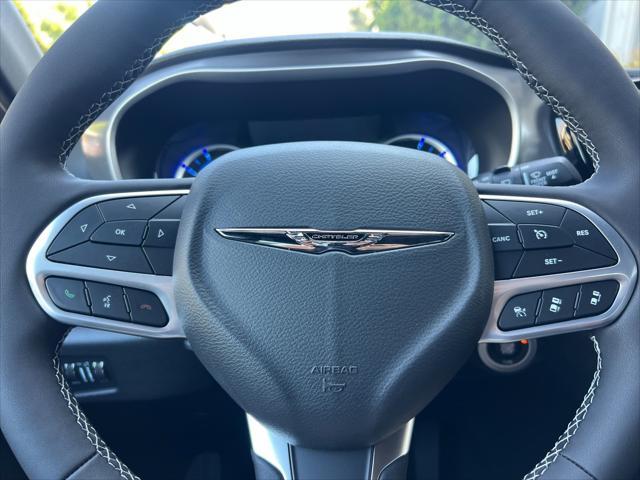 Photo of 2025 Fathom Blue Pearlcoat Chrysler Pacifica Hybrid