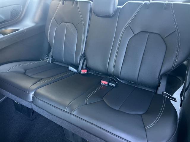 Photo of 2025 Fathom Blue Pearlcoat Chrysler Pacifica Hybrid