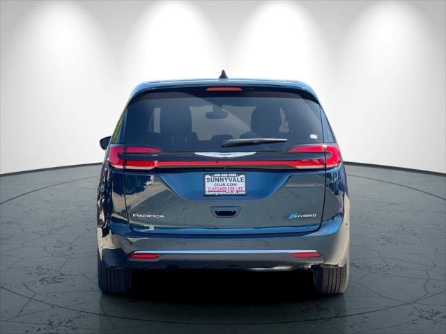 Photo of 2025 Fathom Blue Pearlcoat Chrysler Pacifica Hybrid