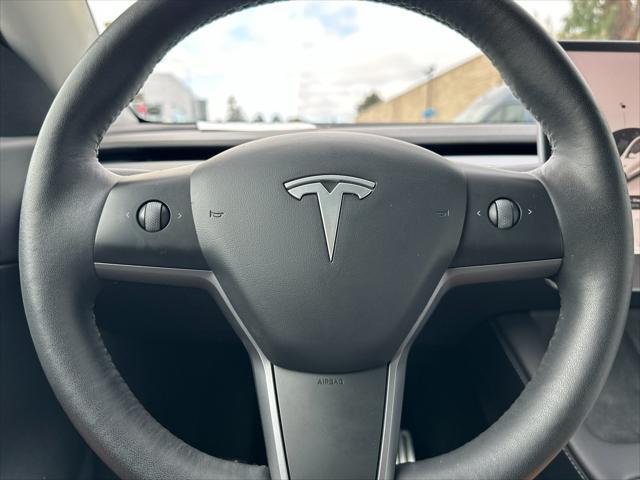 Photo of 2022 Pearl White Multi-Coat Tesla Model Y