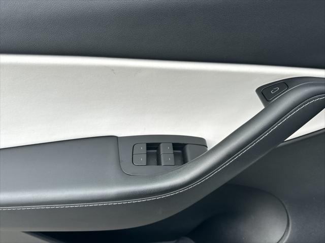 Photo of 2022 Pearl White Multi-Coat Tesla Model Y
