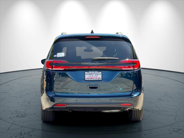 Photo of 2025 Fathom Blue Pearlcoat Chrysler Pacifica Hybrid