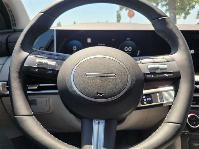Photo of 2025 Deep Sea Hyundai TUCSON Hybrid