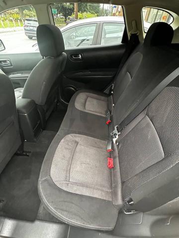 Photo of 2010 Silver Ice Nissan Rogue