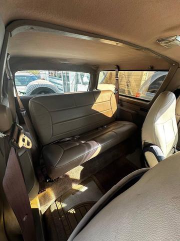 Photo of 1995 Dark Tourmaline Pearl Metallic Ford Bronco