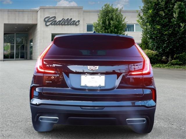Photo of 2024 Stellar Black Metallic Cadillac XT4