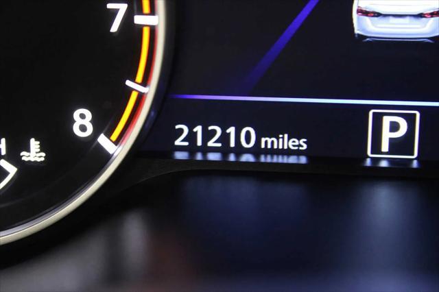 Photo of 2023 Pearl White Tricoat Nissan Altima