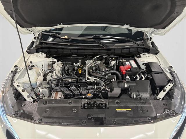 Photo of 2023 Pearl White Tricoat Nissan Altima