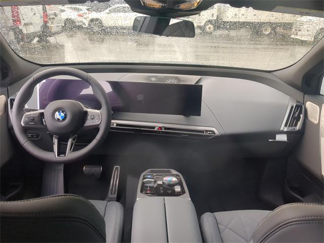 Photo of 2026 Blue Metallic BMW iX