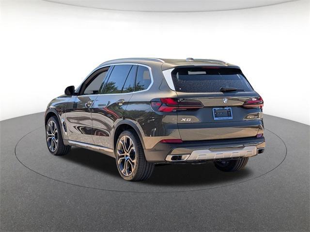 Photo of 2026 Green Metallic BMW X5