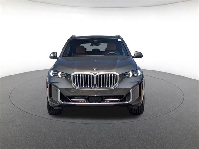 Photo of 2026 Green Metallic BMW X5