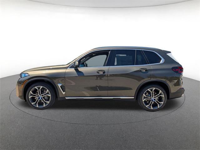 Photo of 2026 Green Metallic BMW X5