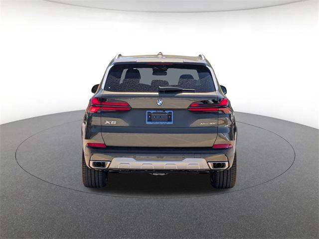 Photo of 2026 Green Metallic BMW X5