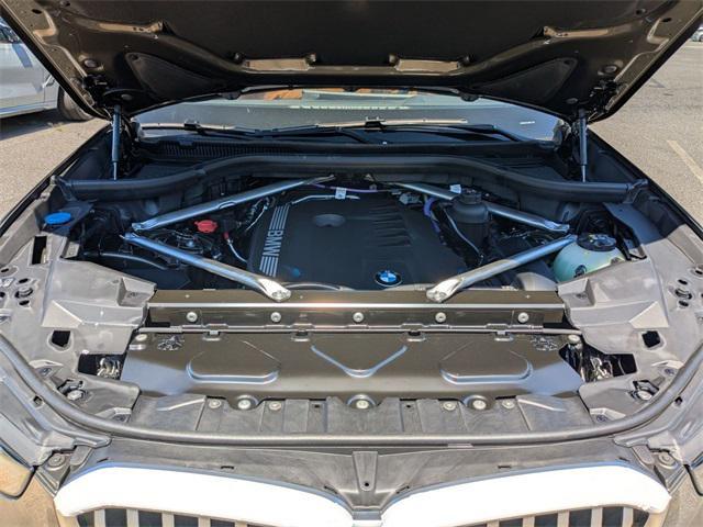 Photo of 2026 Green Metallic BMW X5