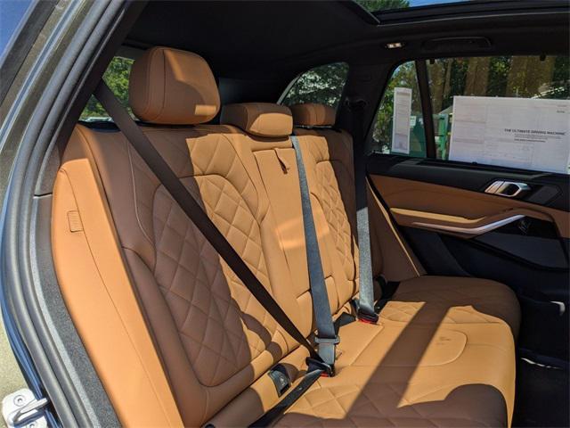 Photo of 2026 Green Metallic BMW X5