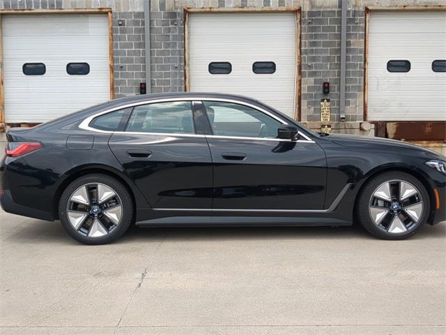 Photo of 2025 Black Sapphire Metallic BMW i4 Gran Coupe
